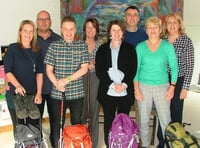 Carers tackle Three Peaks Challenge for residential home garden