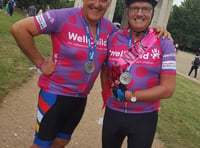 Fundraising pair pedal to the palace for Well Child charity