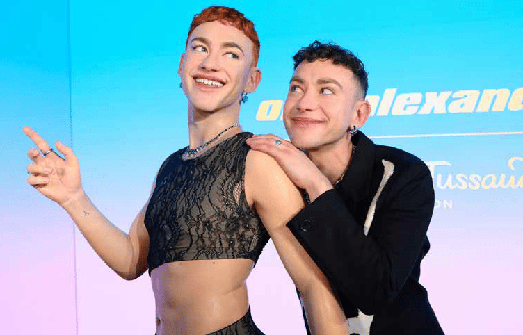 Which is which? It’s hard to tell Olly Alexander apart from his Madame Tussaud waxwork.