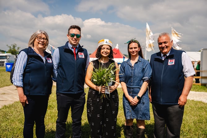 The FUW team at Montgomeryshire were delighted to sponsor the crown at the Urdd Eisteddfod and congratulated winner Tegwen Bruce-Deans (centre) with Mallwyd's Mari Eluned, the crown designer to her right.