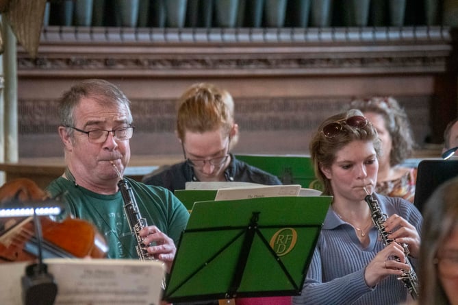 Some of the players in the oboe section.